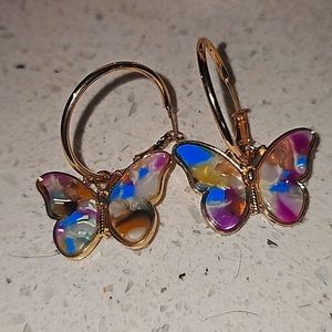 Gold plated butterfly hoop dangling earrings.  Lightweight